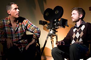 Rodrigo Prieto (left) sharing film secrets with host of The American Society of Cinematographers Breakfast Club, with A film camera on the backdrop.