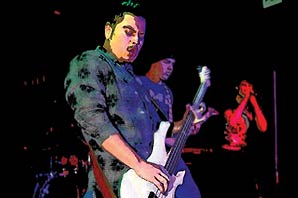 A photo with water-color like PhotoShop effect showing Marcos Hernandez playing his electrical guitar with two other band players.