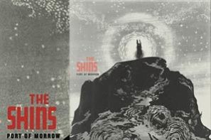 The Shins "Port of Morrow" CD cover with a black-and-white silhouette of a creature siting on top the mountain.
