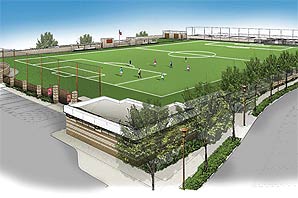 An illustration of the anticipated finished soccer field with soccer players playing in the field under blue sky. The field is surrounded by tall fences, tall trees, and ample parking.