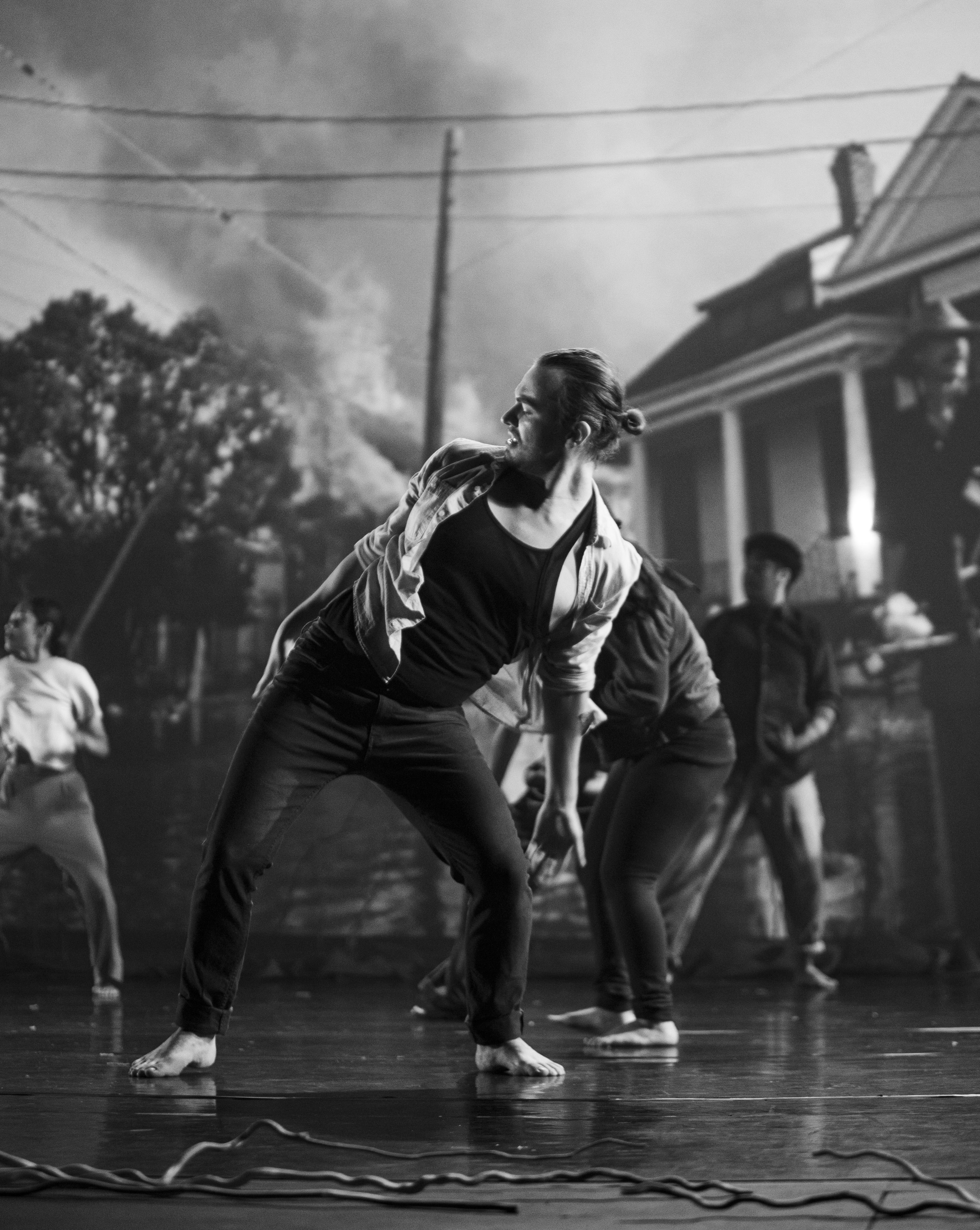 Austin Leon embodies the physical and emotional destruction that natural disasters cause with every sharp movement in choreographer Cyrian Reed’s dance paying homage to Hurrican Katrina, “Levees – The Waters We Must Stand On.” Ashley Ramynke / el Don