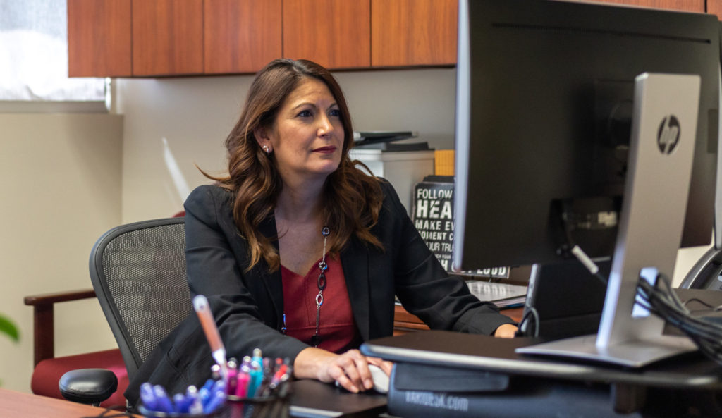 SAC president at her desk in fall 2020