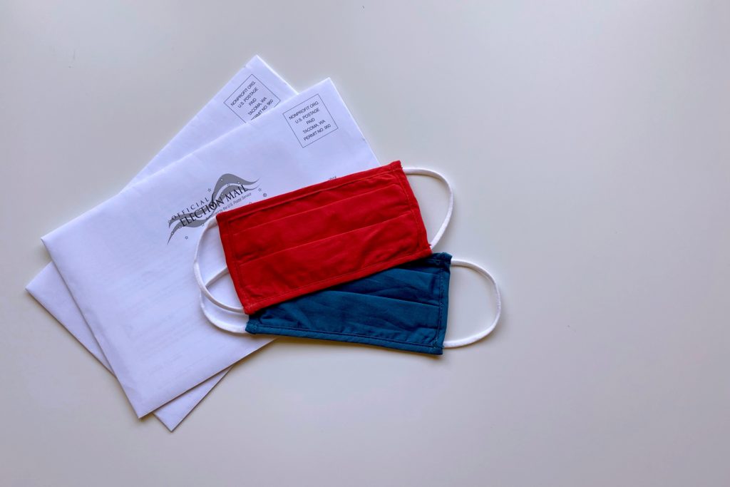 red and blue pouch on white paper