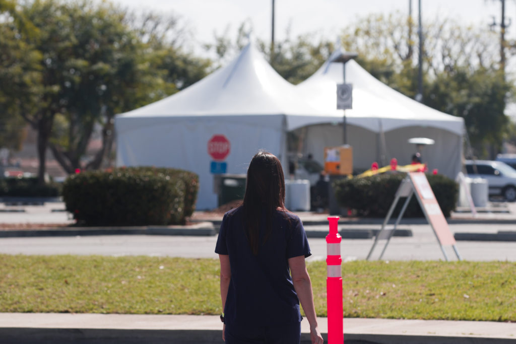 Nurse walking back to POD station at SAC/ Image By: Julian Reynoso