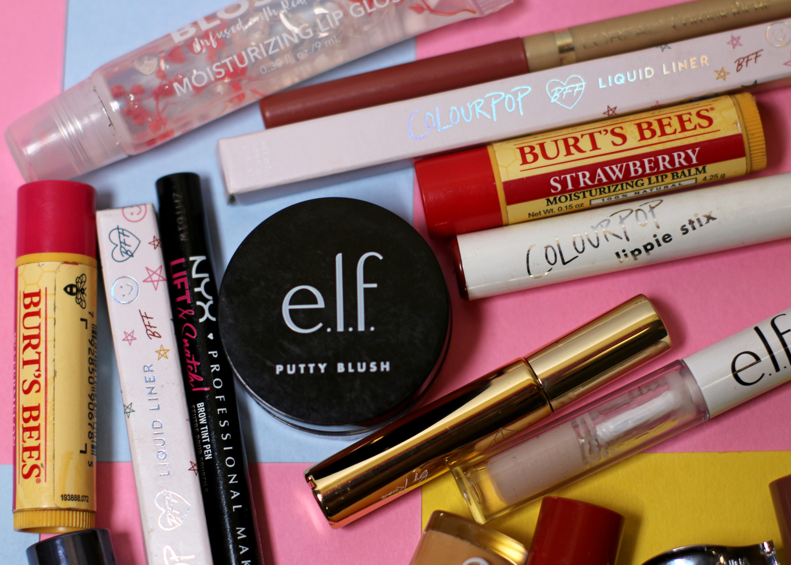 Various products are spread out, including e.l.f, Burt's Bees, ColourPop and NYX.