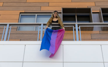 Jakki holding a Bi-Flag