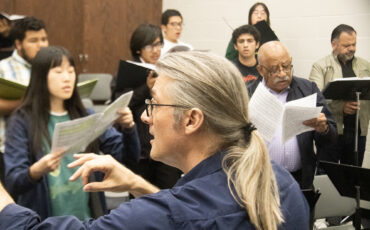 Dr Jones Directing Choir Practice (Photo by Zendy Garrido)