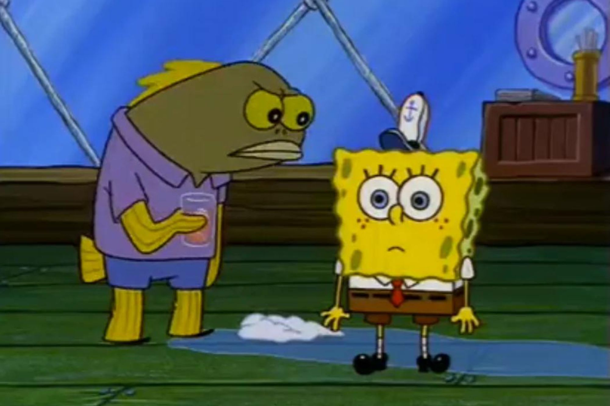 A fish looking at SpongeBob with an upset expression