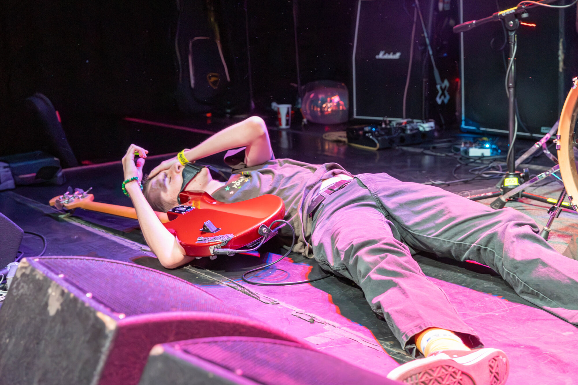 Musician laying down on the stage