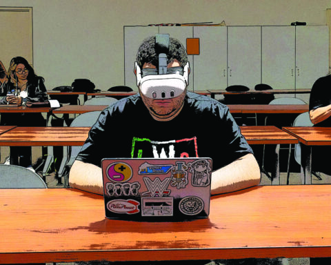 A student using a VR headset in class