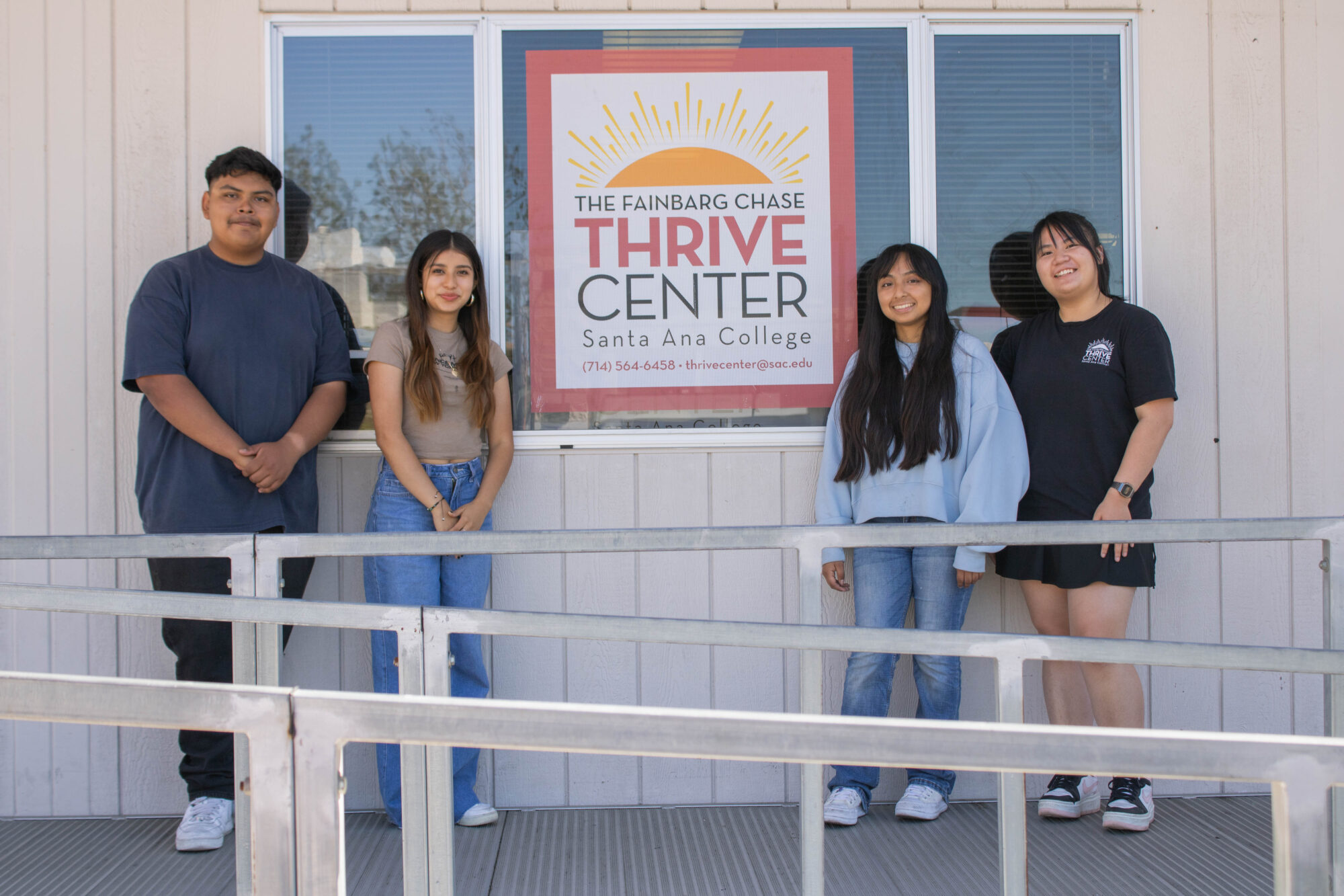 A group of students standing outside of the Thrive Center