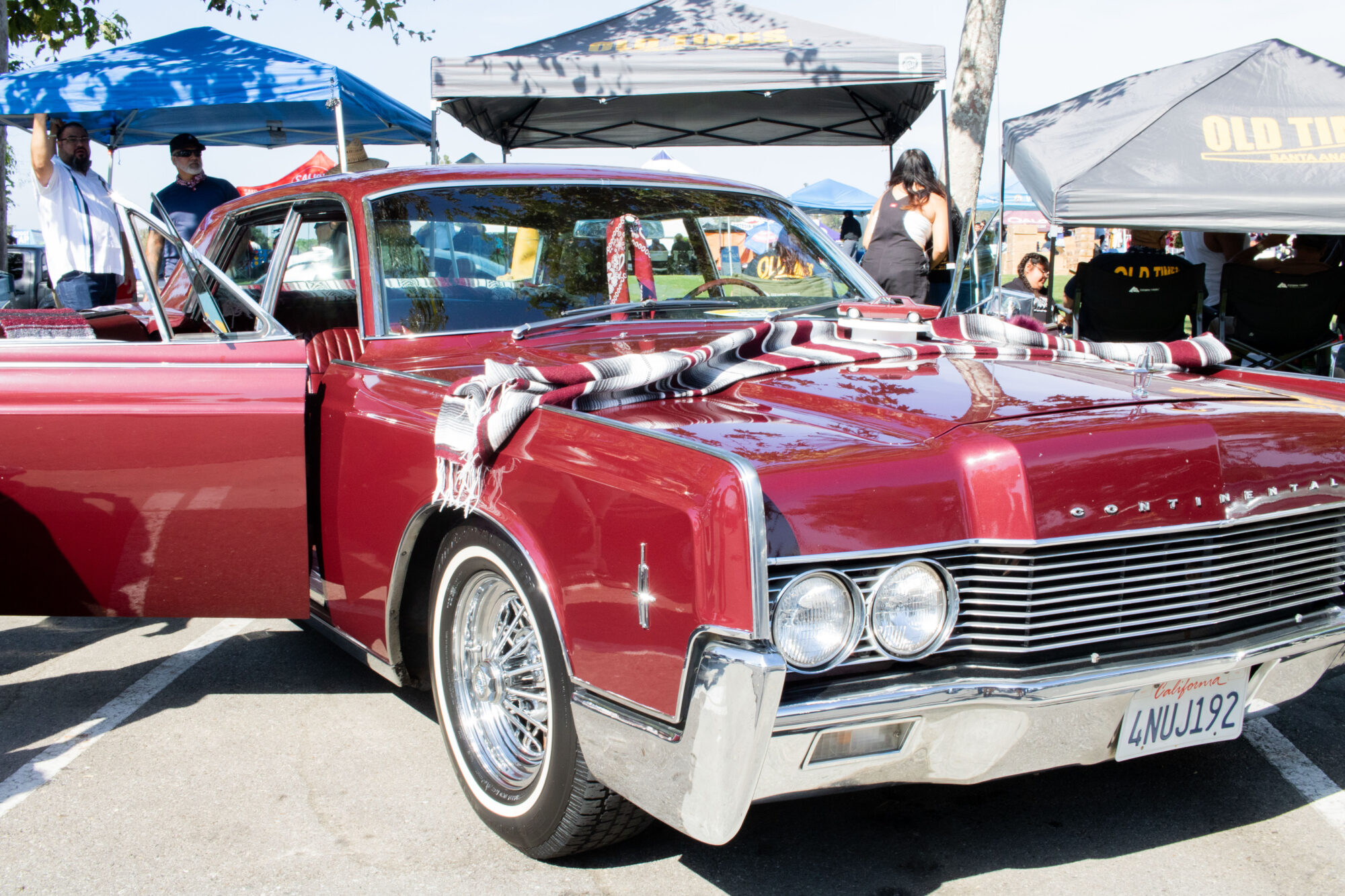 A Lincoln Continental with a miniature version on its hood