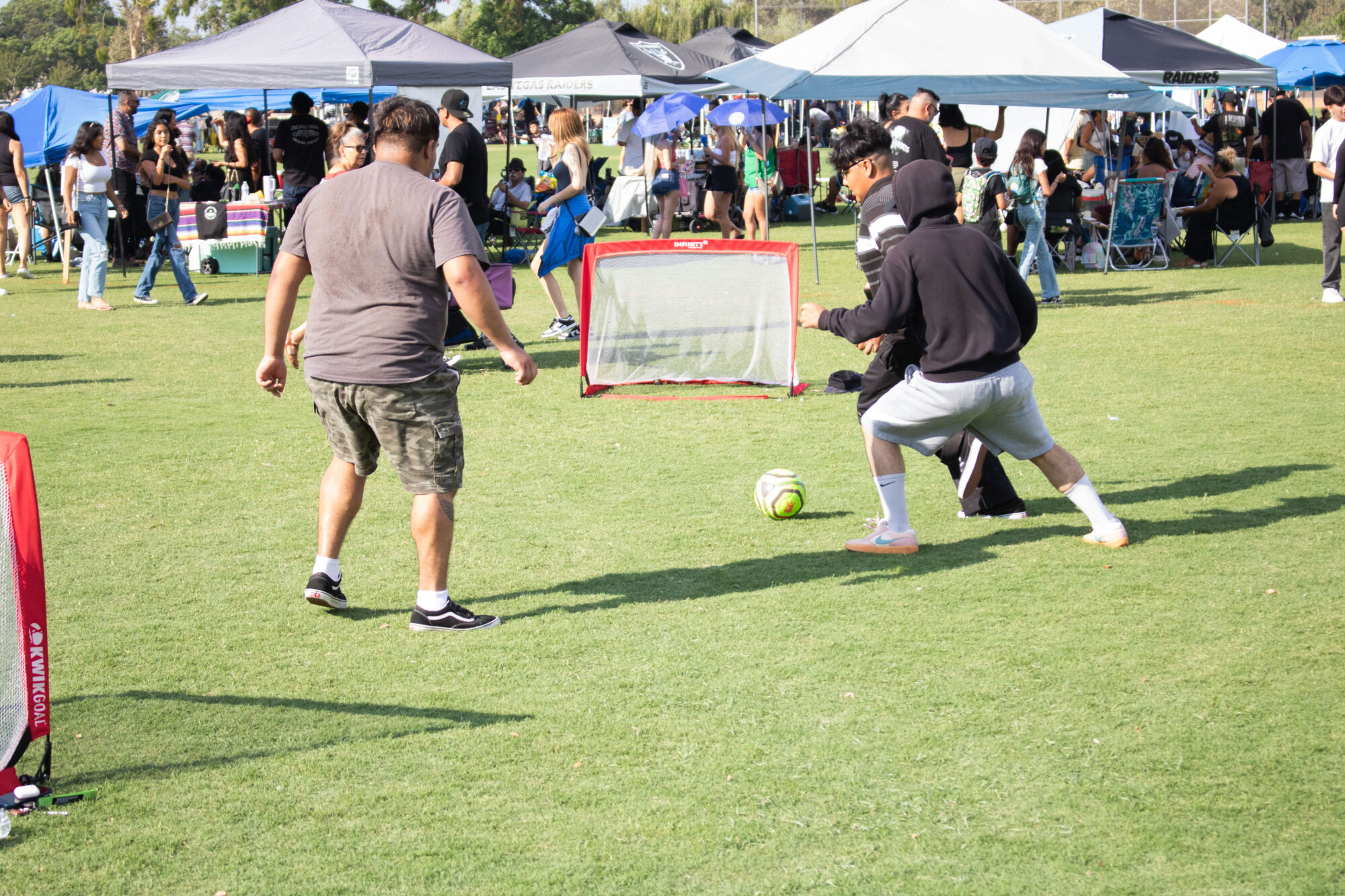 A group of kids playing soccer