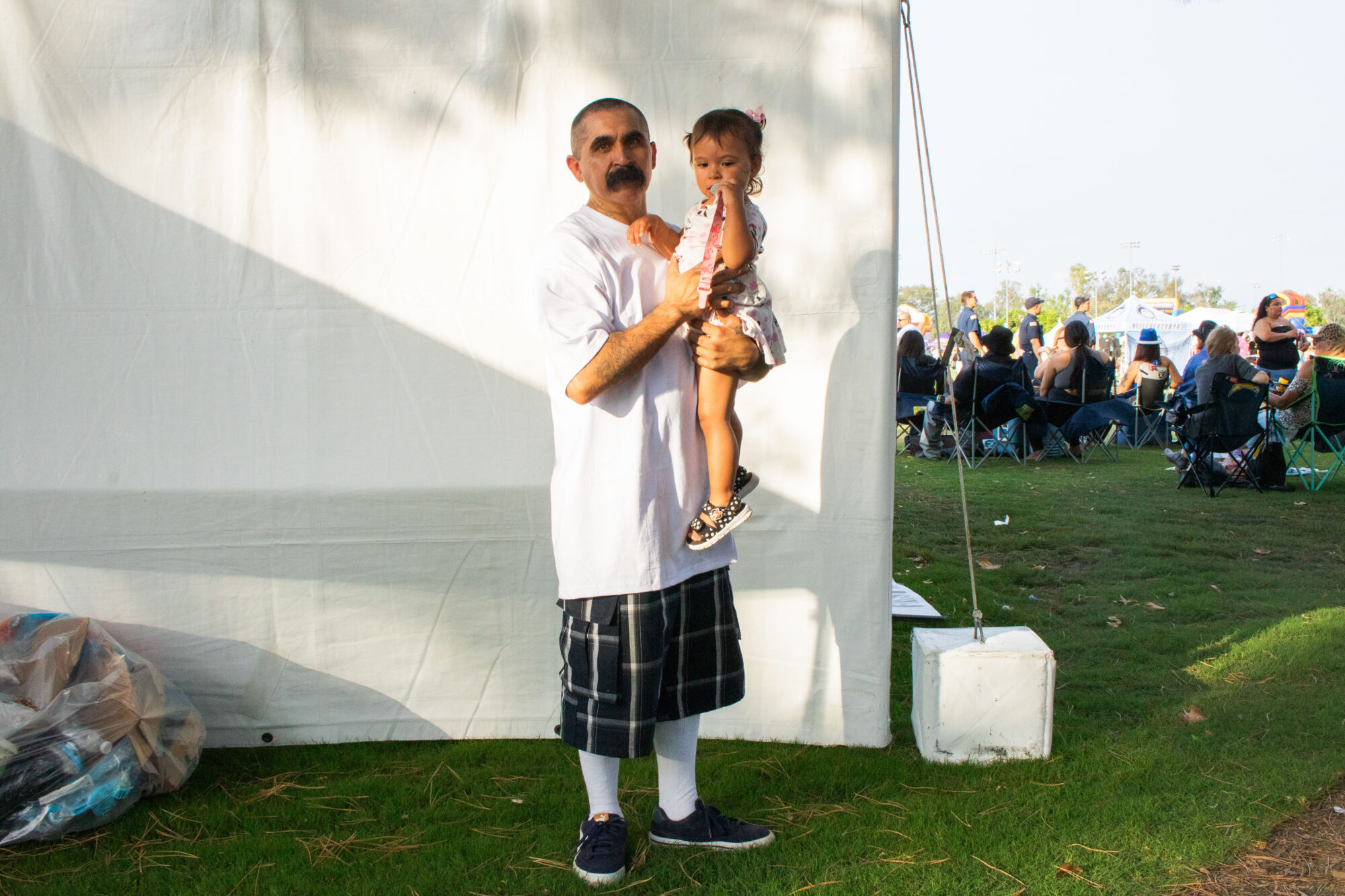 A man holding a small child