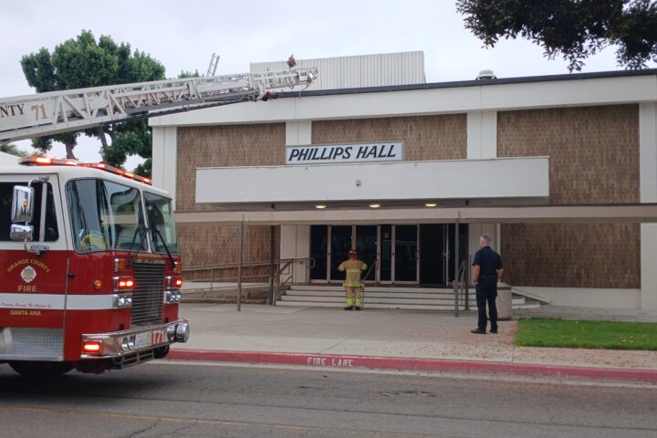 Fire officials and campus security in front of Phillips Hall