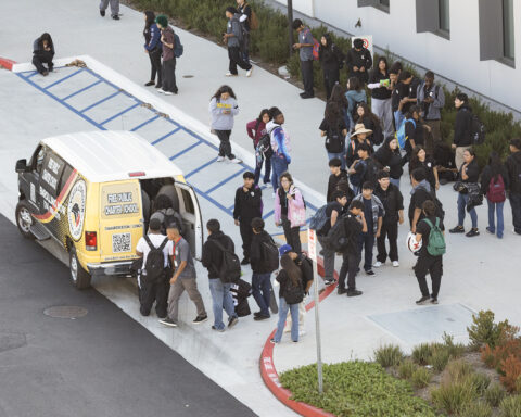 Vista Meridian students getting into a school van after school