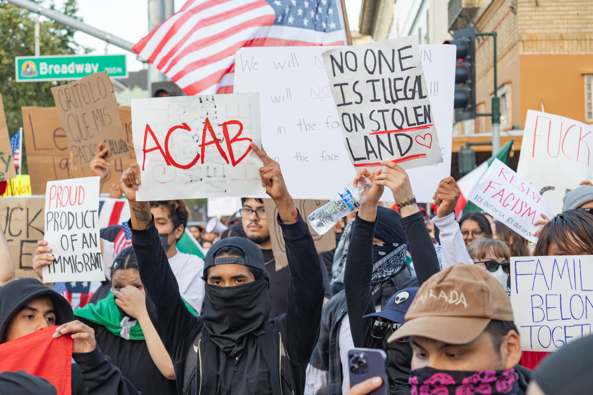 Protesters holding signs