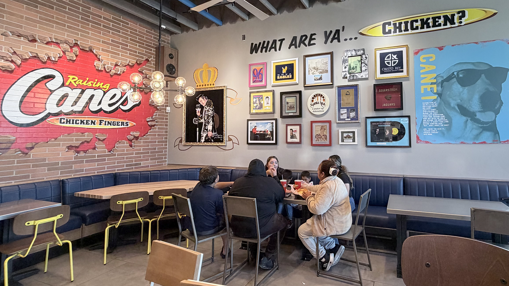 Family sitting in dining room.