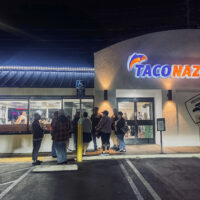 A group of people standing outside the new Taco Nazo location in Santa Ana.