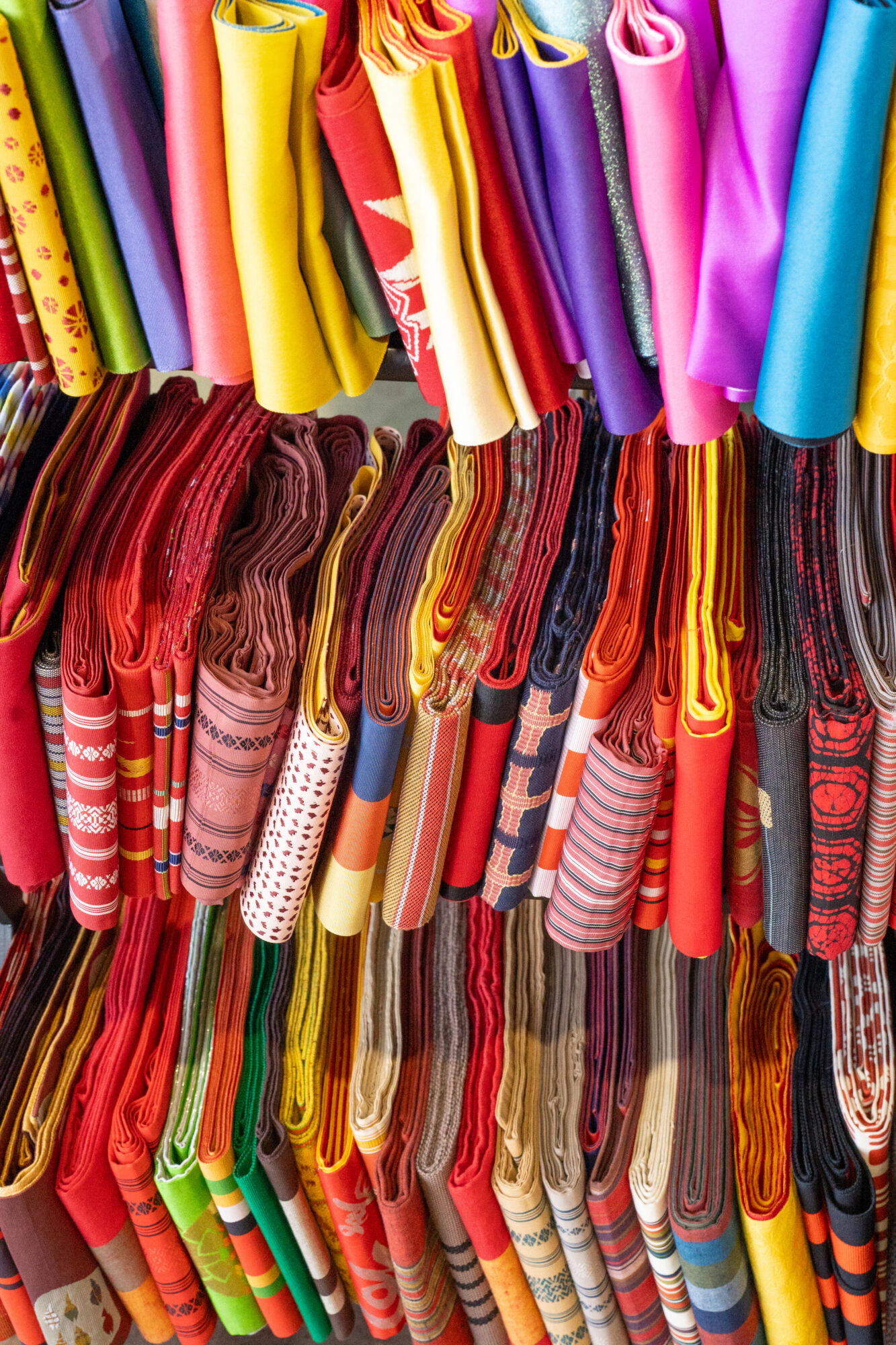 Colorful selection of kimono sashes.