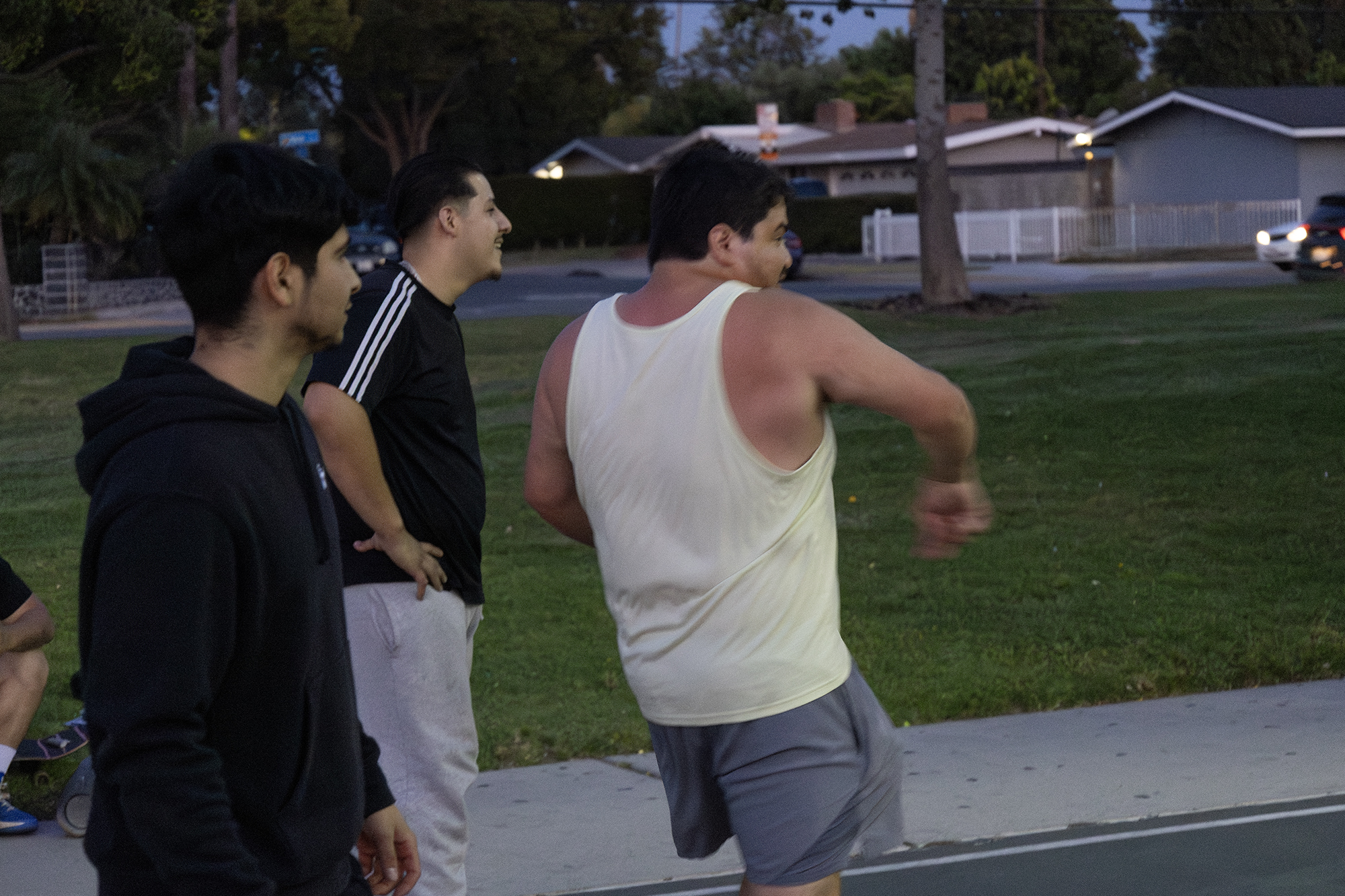 Three men playing handball